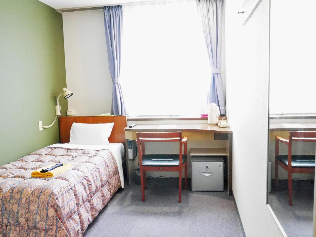 Station Business Hotel Tenshukaku Hitoyoshi Buitenkant foto
